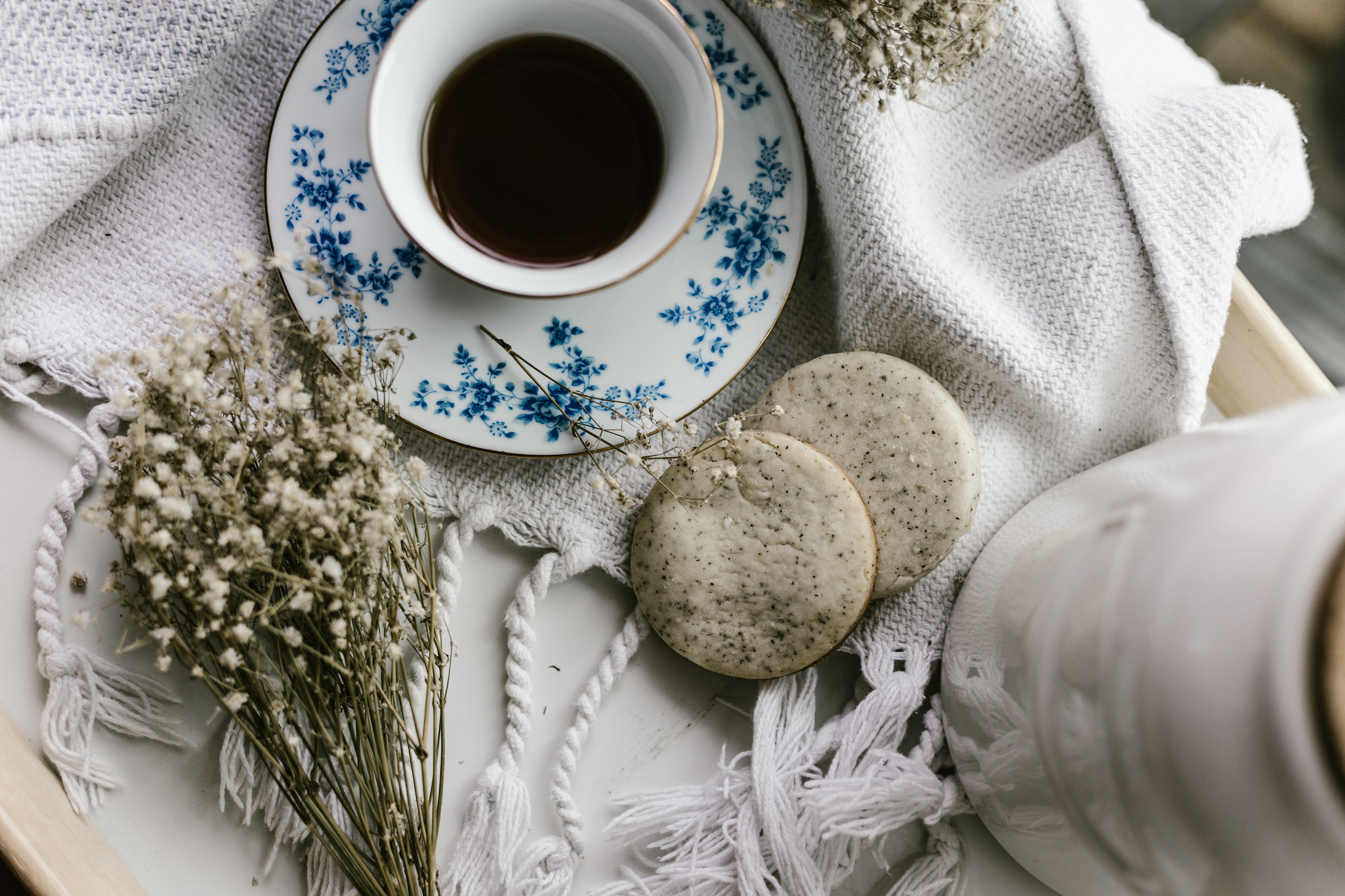 table with coffee and cookie and lavender